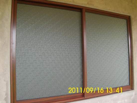 Instalacion de ventanas en aluminio imitacion madera